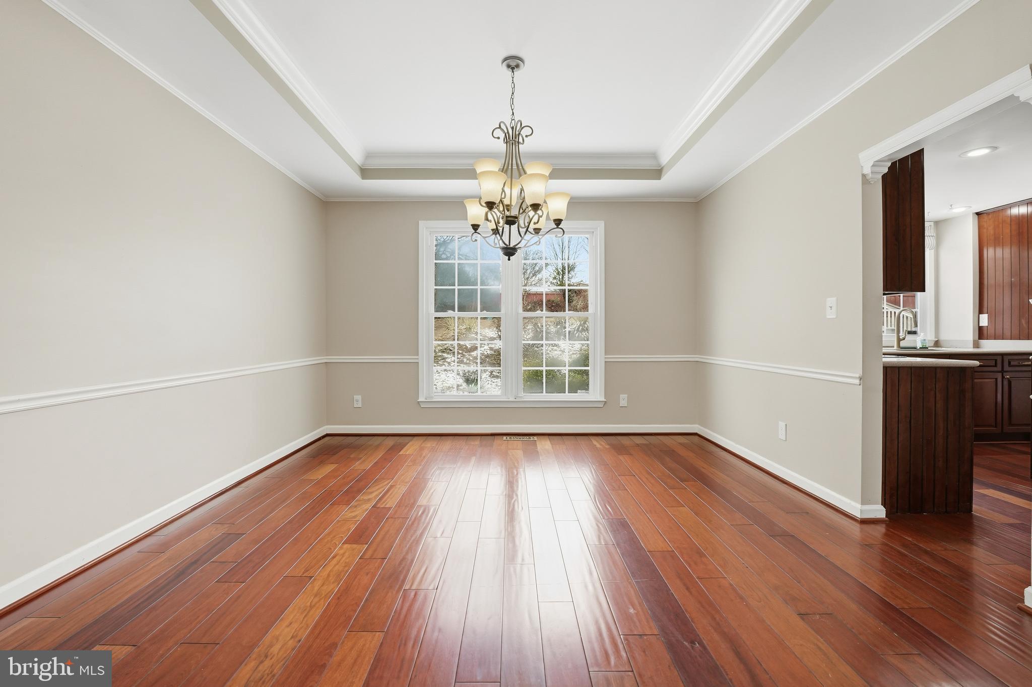 3582 Lions Field Road Triangle, VA 22172 - Photo 17 of 66 wooden floor in an empty room with a window