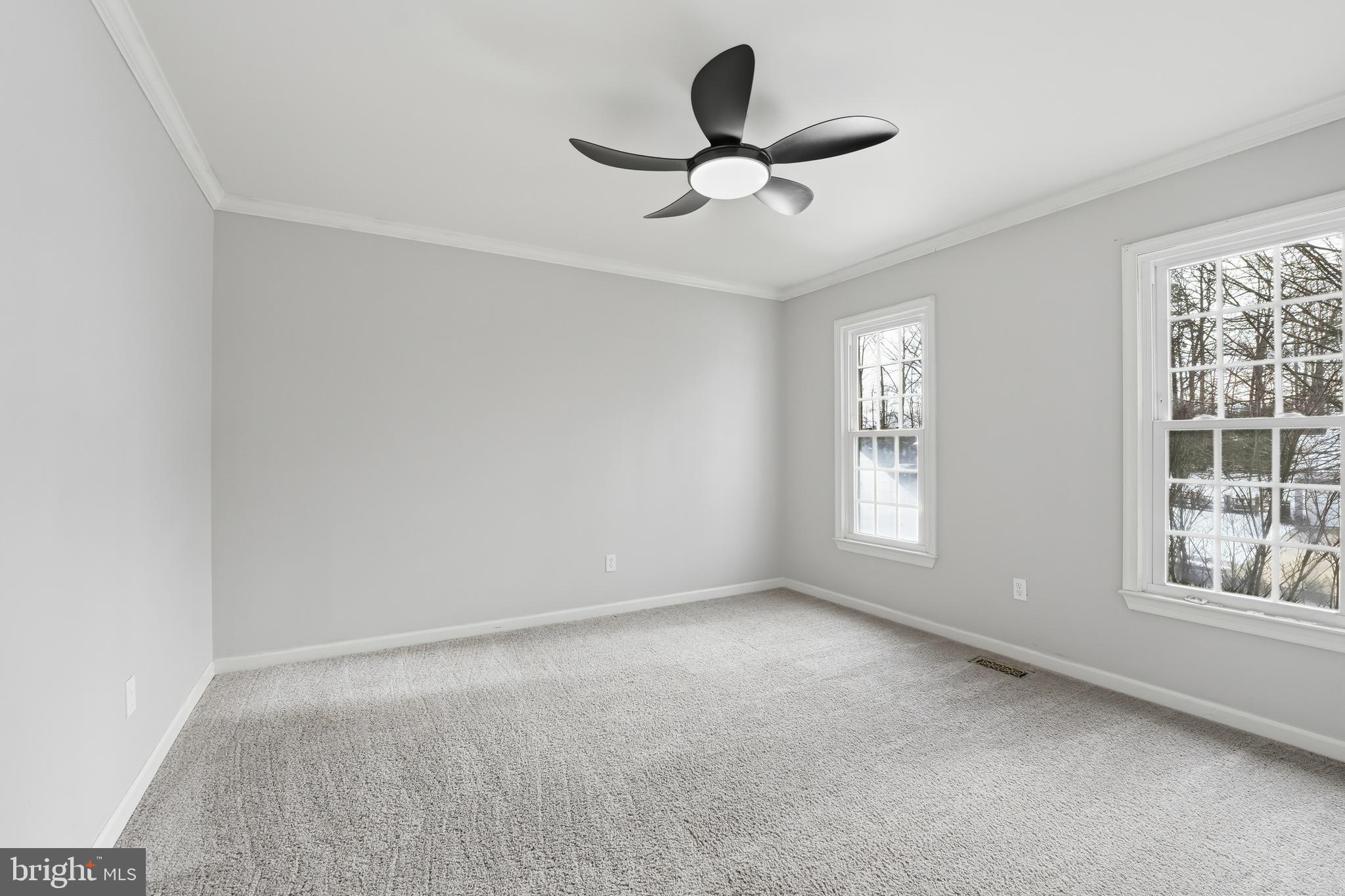 3582 Lions Field Road Triangle, VA 22172 - Photo 32 of 66 a view of an empty room with a window