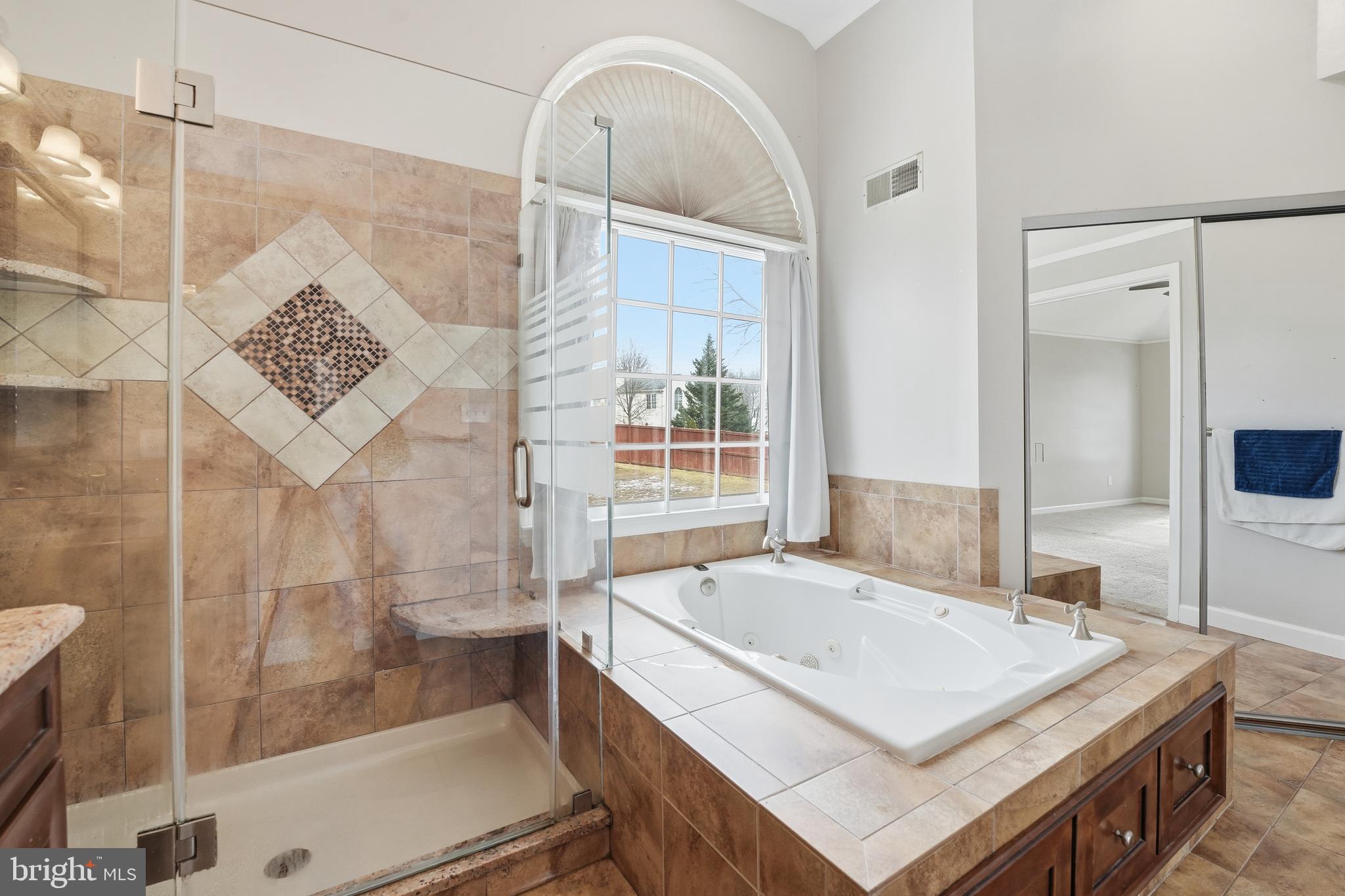 3582 Lions Field Road Triangle, VA 22172 - Photo 36 of 66 a bathroom with a sink and a mirror