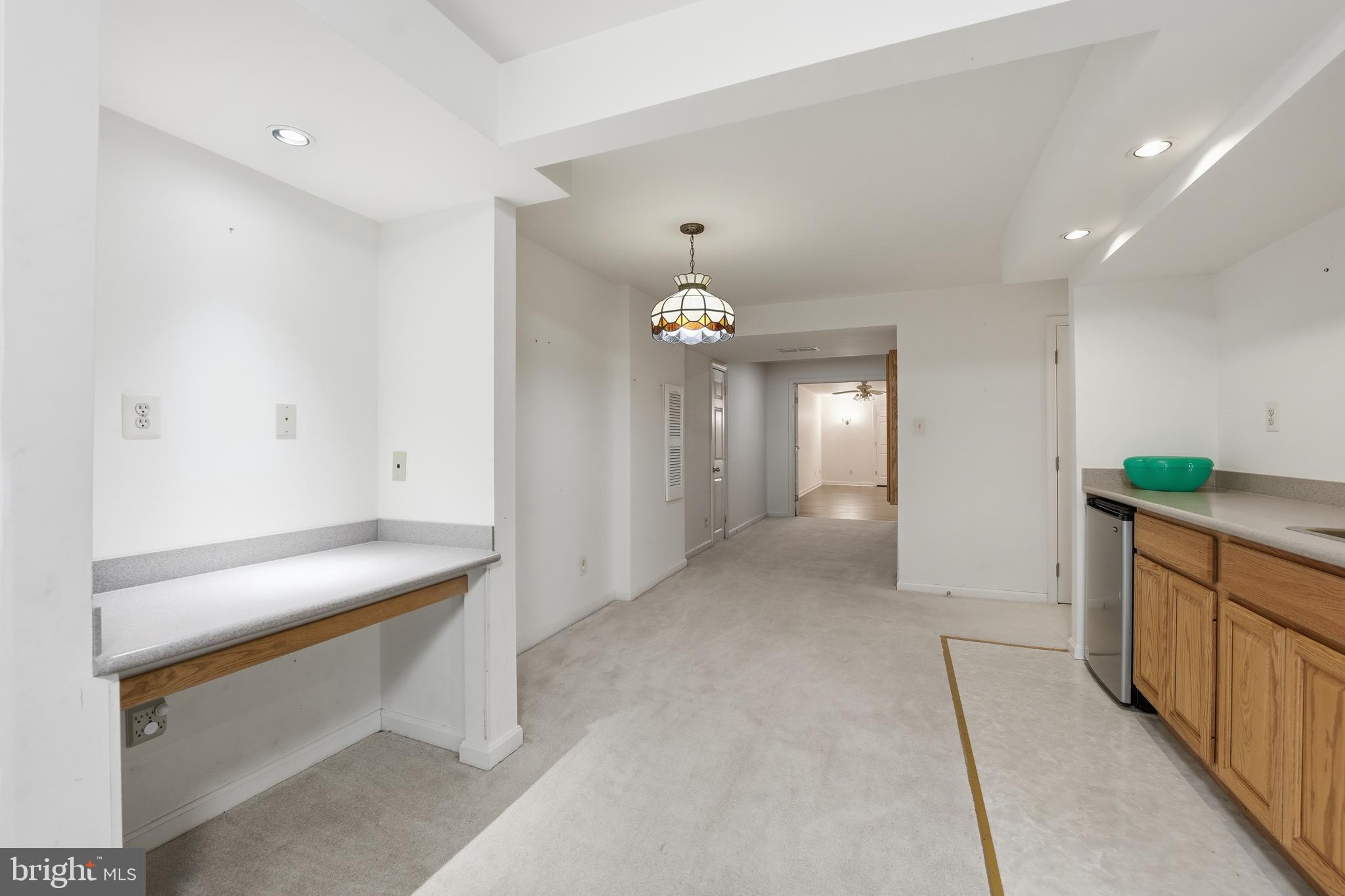 3582 Lions Field Road Triangle, VA 22172 - Photo 41 of 66 a view of a kitchen cabinets and a center island
