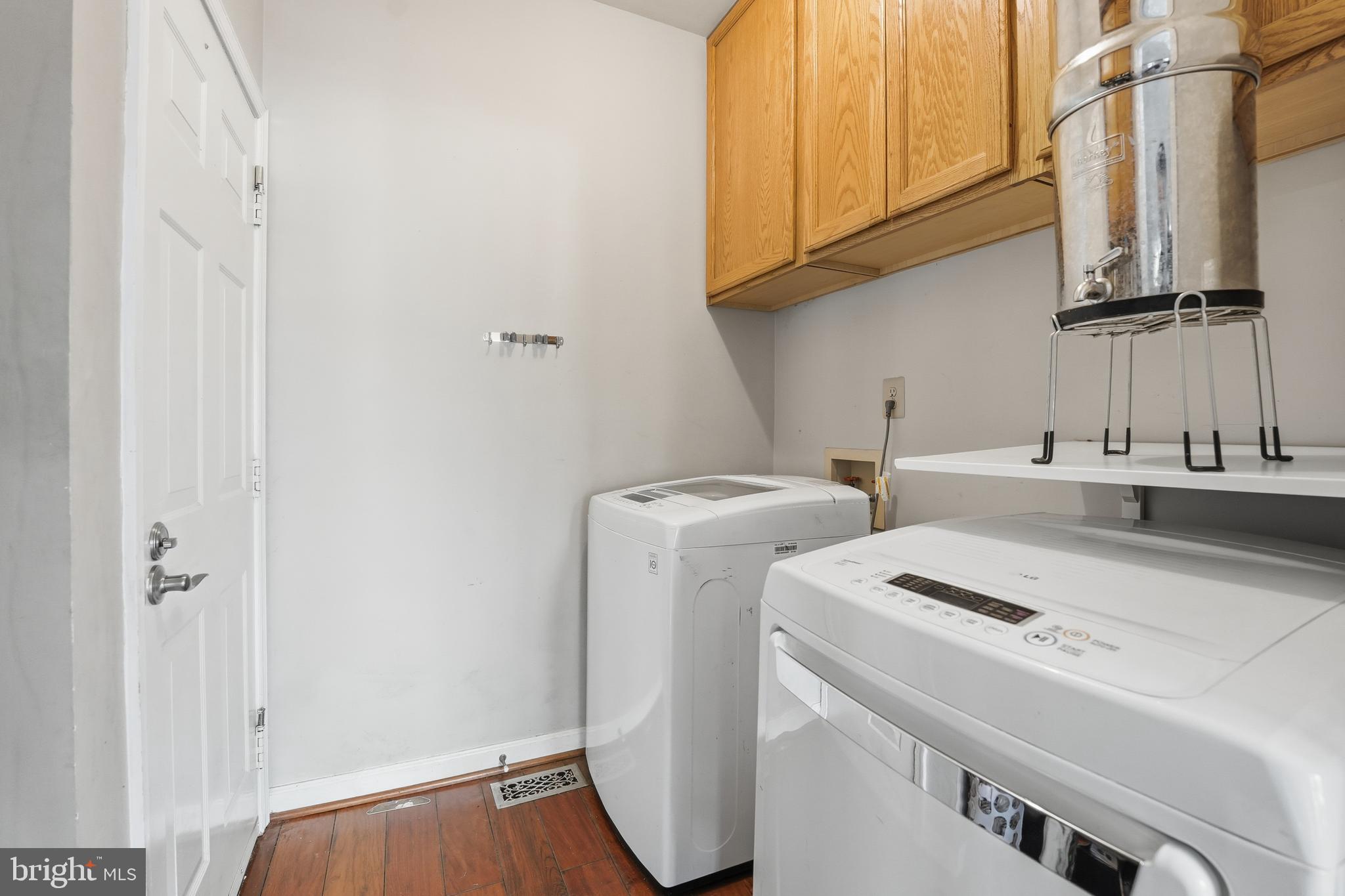 3582 Lions Field Road Triangle, VA 22172 - Photo 43 of 66 a utility room with dryer and washer