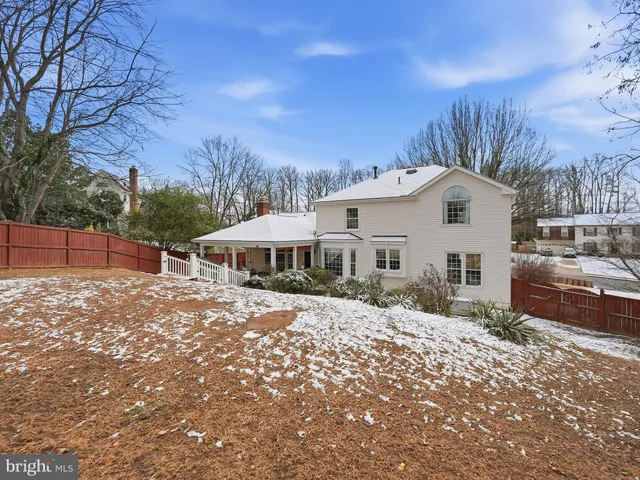 a kitchen with stainless steel appliances a refrigerator and a stove