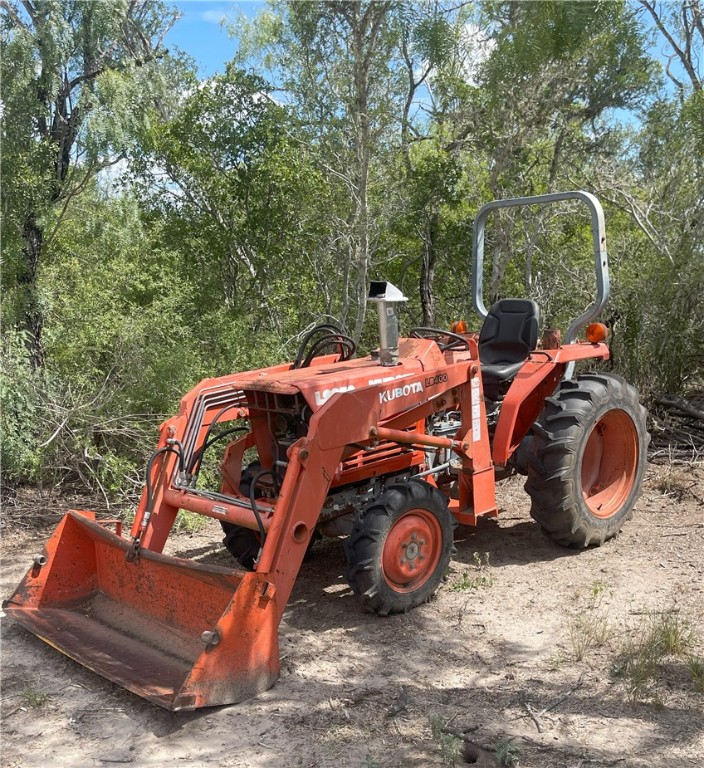 211 County Road 229 Three Rivers, TX 78071 - Photo 17 of 18 a view of a car in the back yard