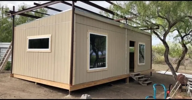 a view of a house with a large window