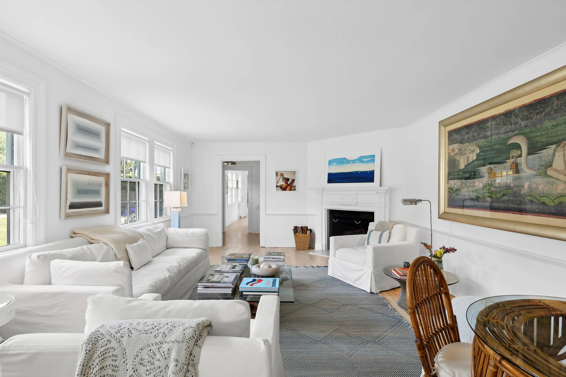93 Egypt Lane East Hampton, NY 11937 - Photo 12 of 50 a living room with furniture a fireplace and a flat screen tv