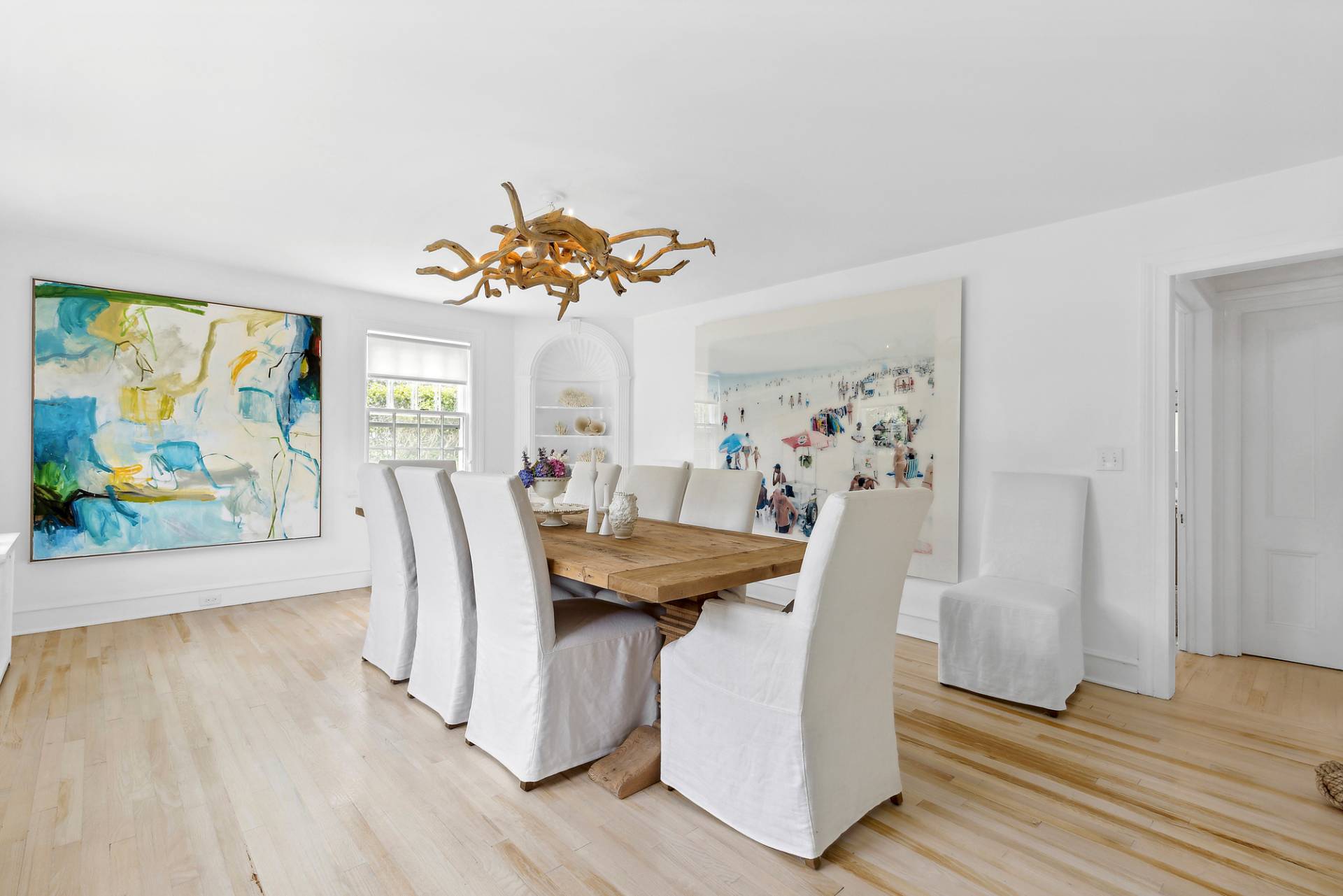 93 Egypt Lane East Hampton, NY 11937 - Photo 19 of 50 a view of a dining room with furniture and wooden floor