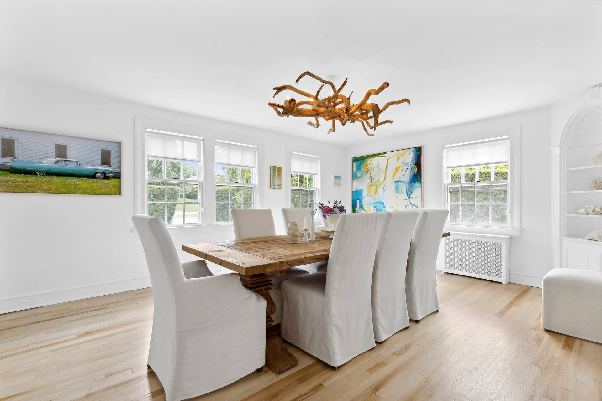 93 Egypt Lane East Hampton, NY 11937 - Photo 20 of 50 a view of a dining room with furniture and wooden floor