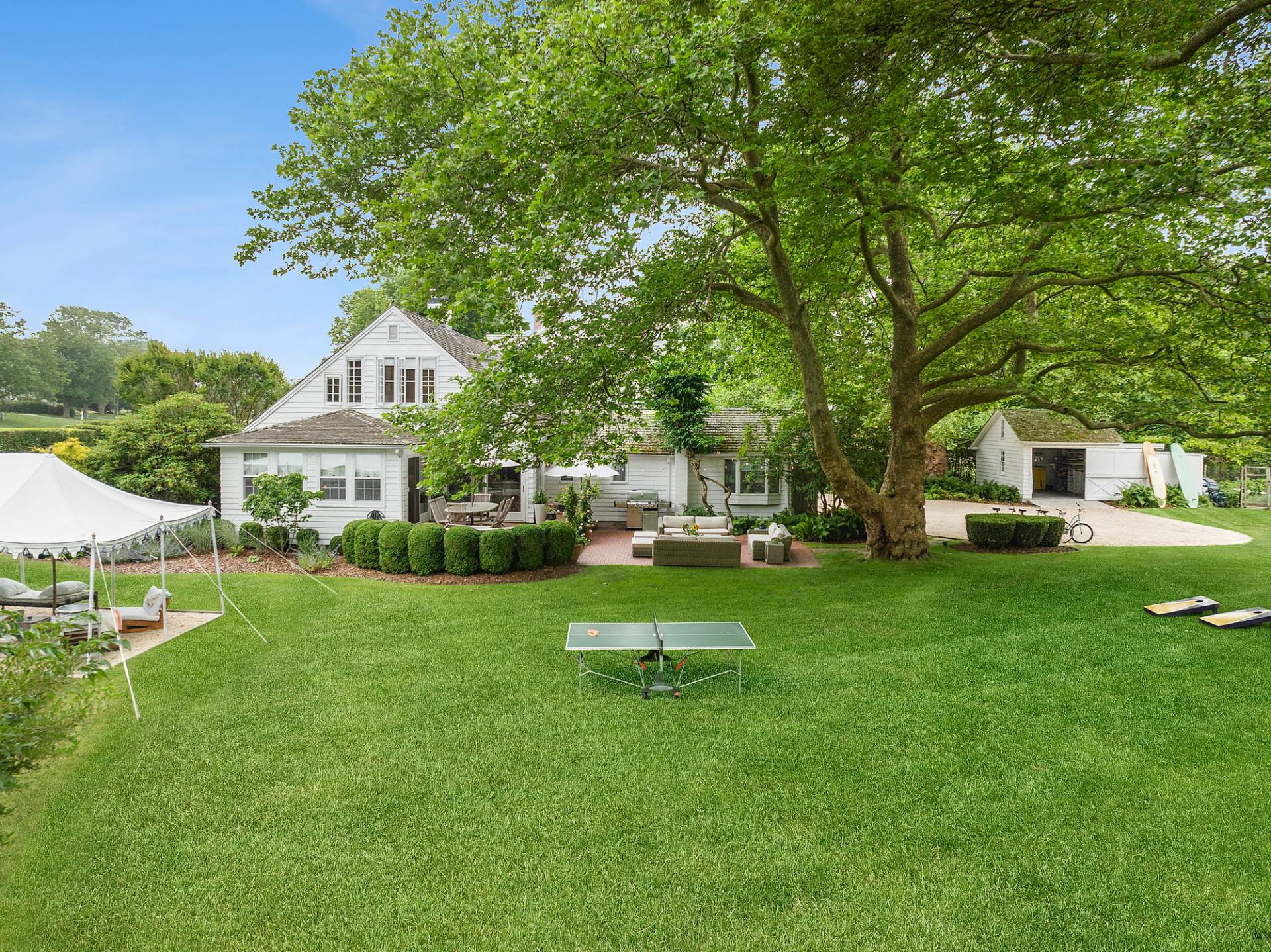 93 Egypt Lane East Hampton, NY 11937 - Photo 48 of 50 a house view with a garden space