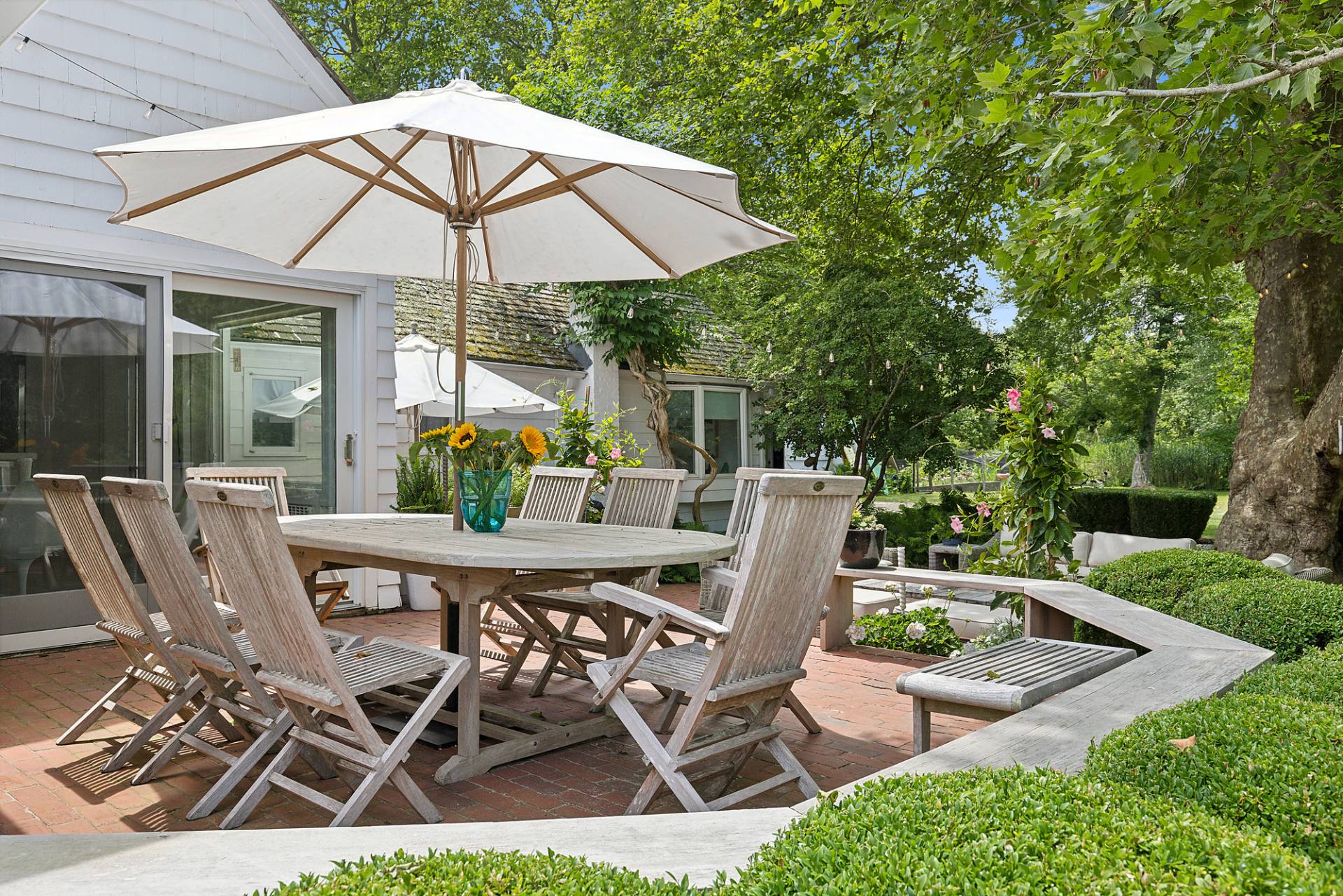 93 Egypt Lane East Hampton, NY 11937 - Photo 9 of 50 a view of an outdoor sitting area with furniture and backyard