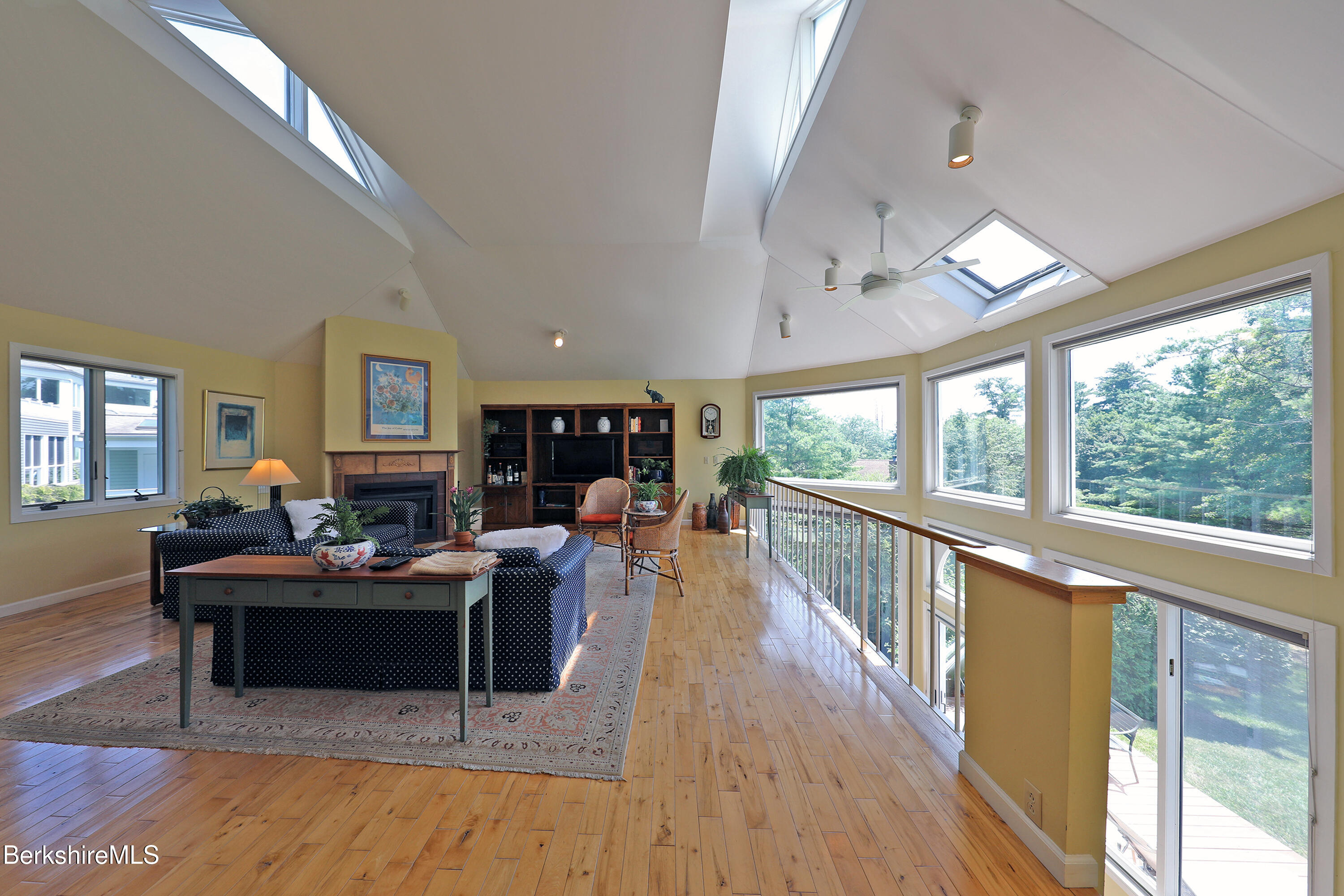 19 Hawthorne Road, Unit GH 4 Stockbridge, MA 01262 - Photo 11 of 46 a living room with furniture and a large window