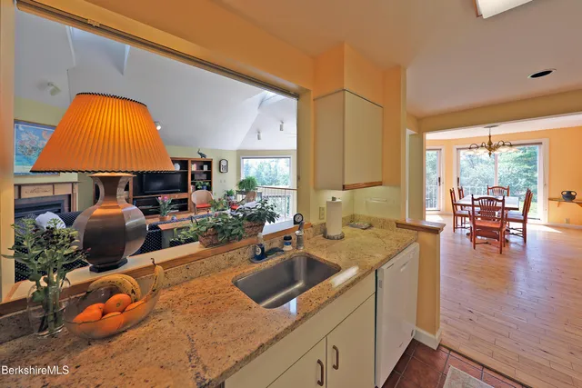 a room with furniture and a wooden floor