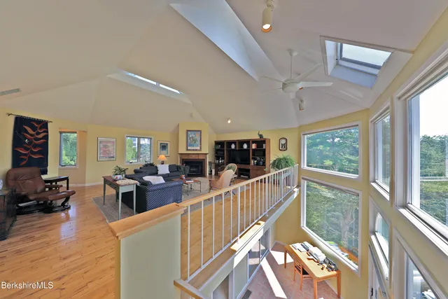 a view of a living room and dining room