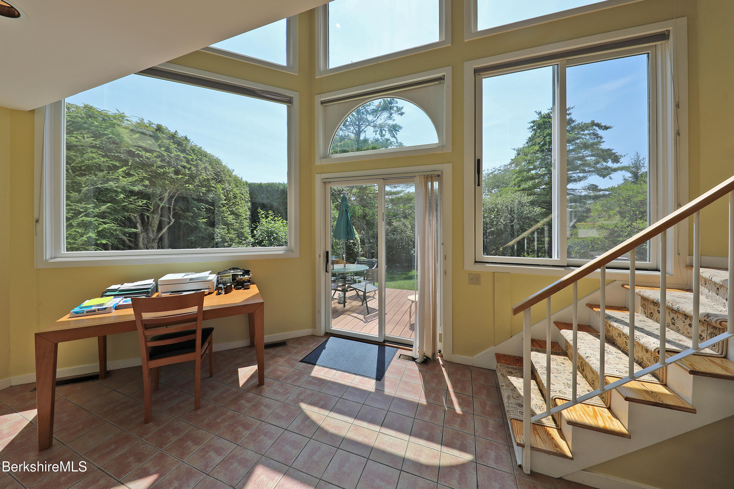 19 Hawthorne Road, Unit GH 4 Stockbridge, MA 01262 - Photo 21 of 46 a outdoor room with wooden floor and windows