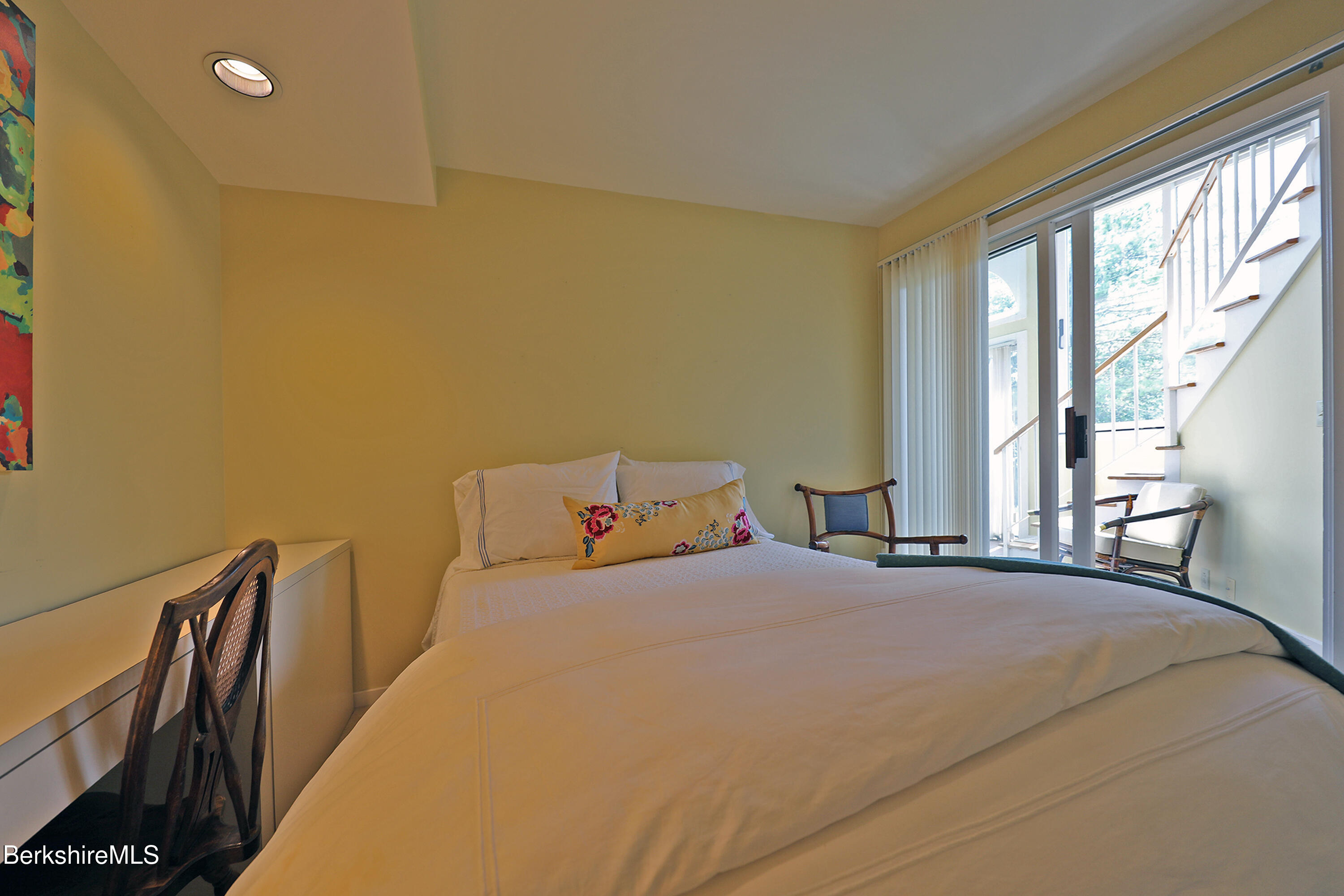 19 Hawthorne Road, Unit GH 4 Stockbridge, MA 01262 - Photo 33 of 46 a bedroom with a bed and a large window