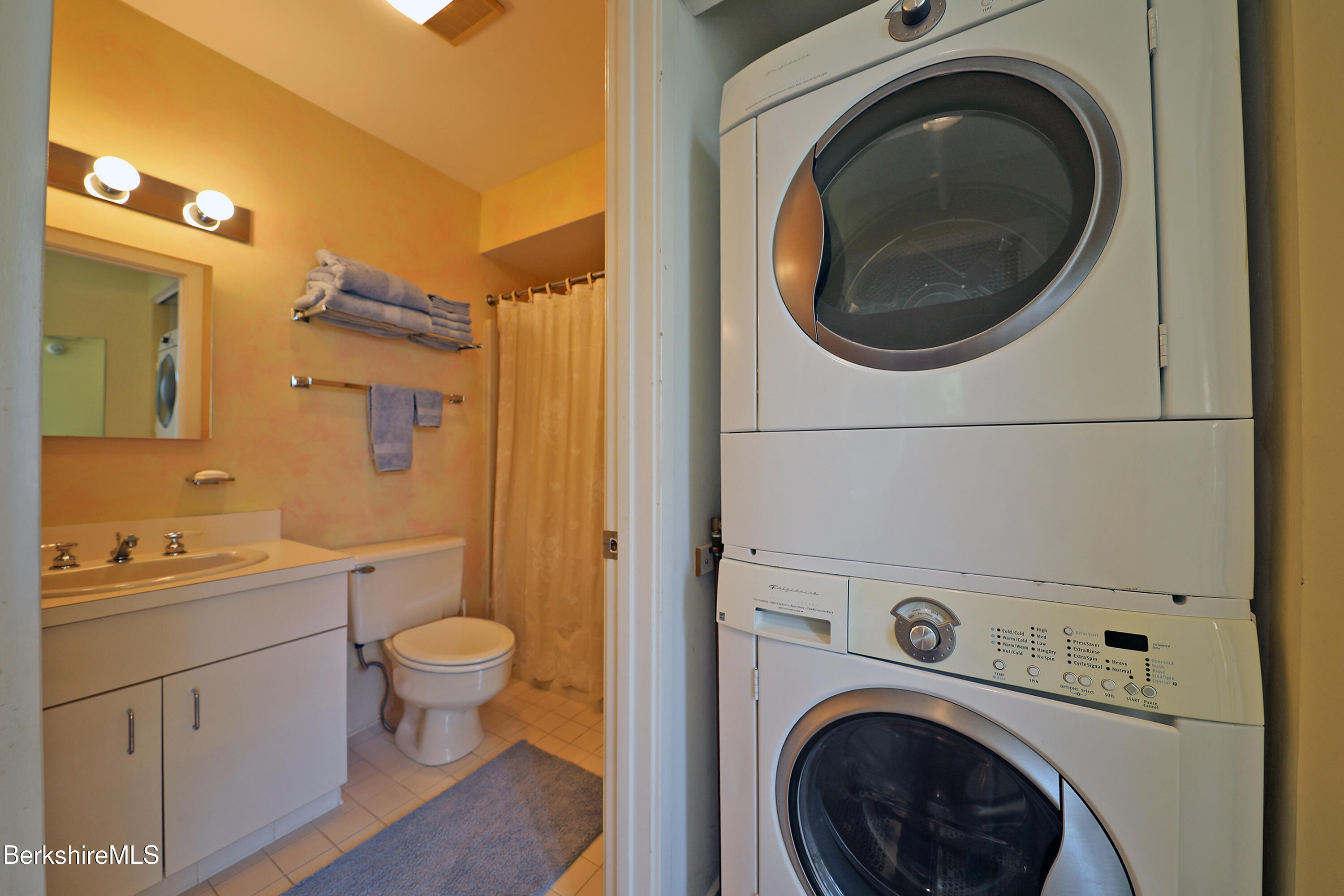 19 Hawthorne Road, Unit GH 4 Stockbridge, MA 01262 - Photo 36 of 46 a view of a bathroom with washing machine and sink