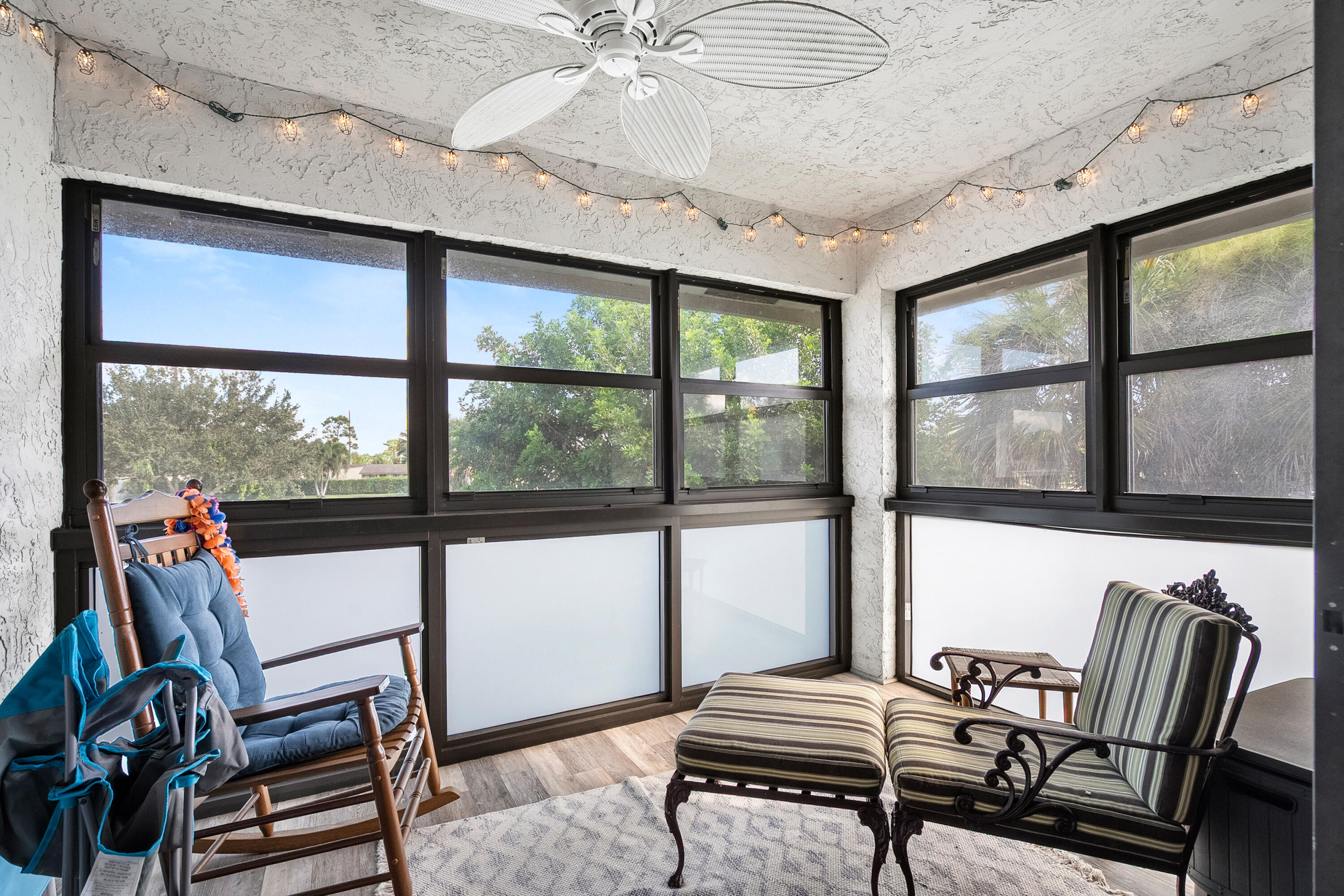 1250 Southeast Parkview Place, Unit C10 Stuart, FL 34994 - Photo 3 of 19 a living room with furniture and a window