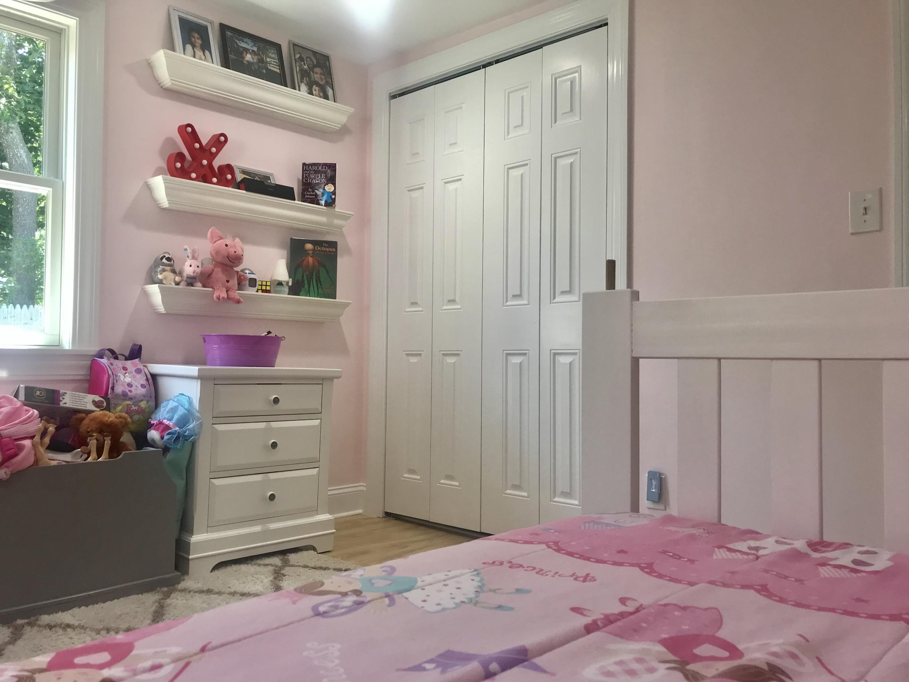 162 Spring Street Hyannis, MA 02601 - Photo 16 of 30 a bedroom with a bed and cabinets