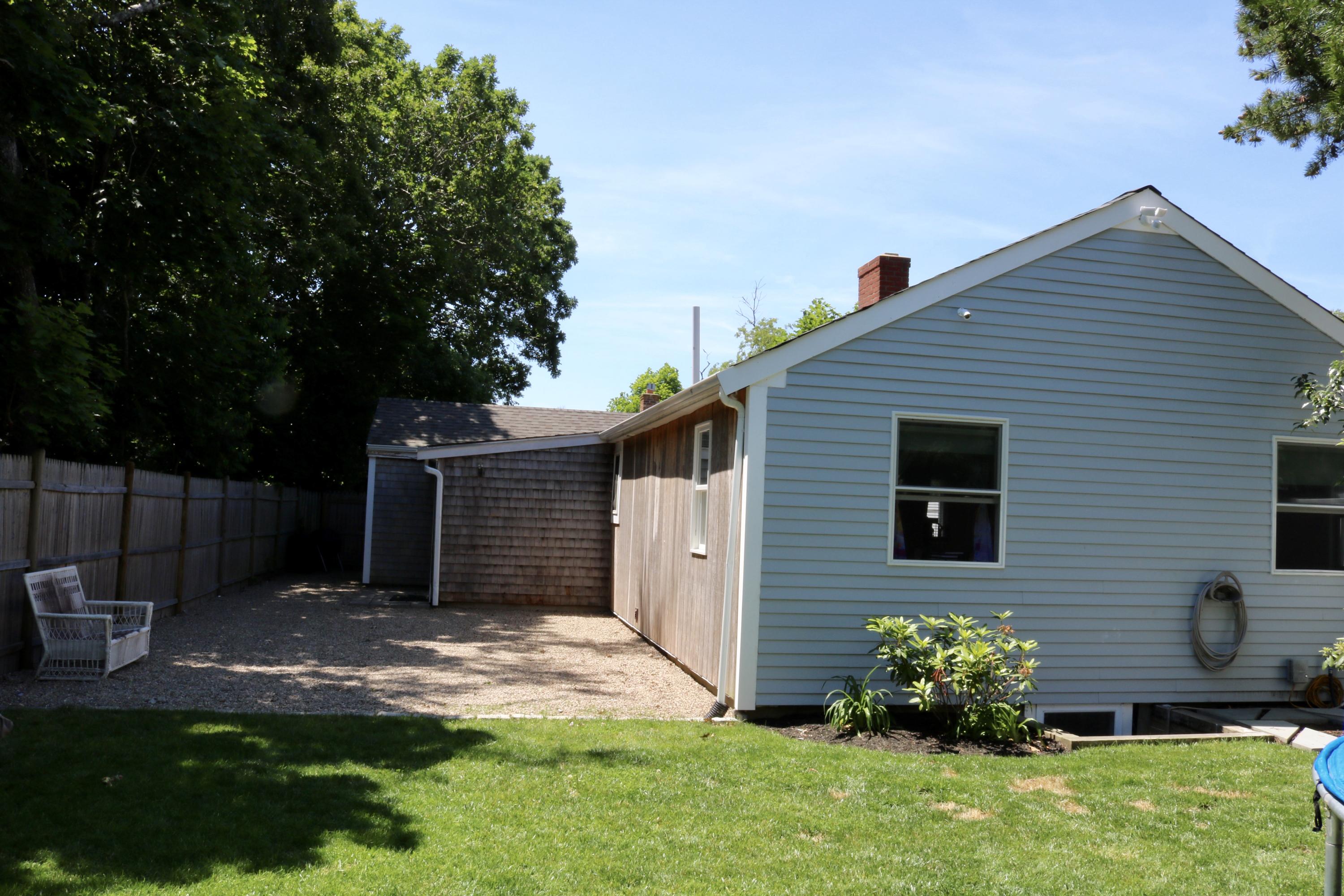 162 Spring Street Hyannis, MA 02601 - Photo 23 of 30 a front view of a house with a yard