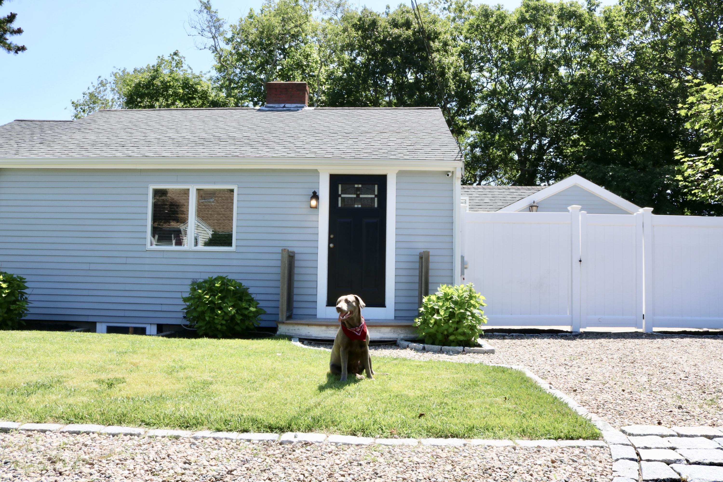 162 Spring Street Hyannis, MA 02601 - Photo 4 of 30 a view of a house with a yard