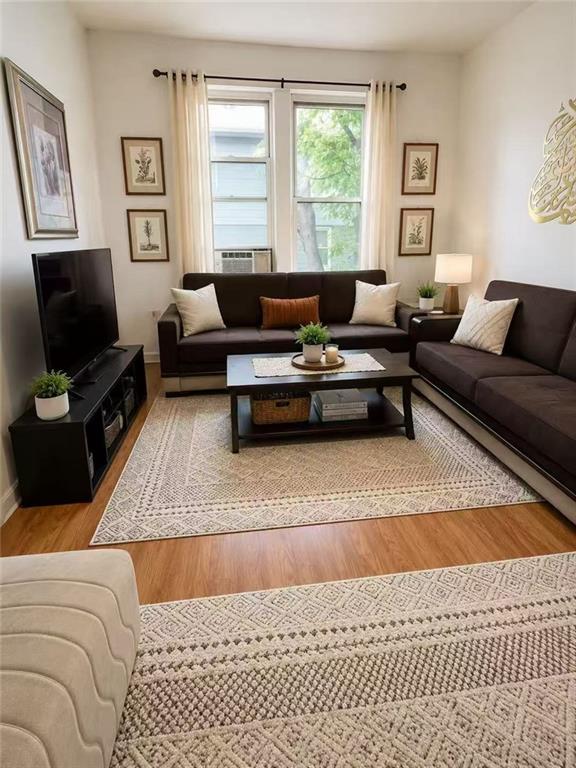 1564 Bay Ridge Avenue Brooklyn, NY 11219 - Photo 8 of 14 a living room with furniture and a flat screen tv