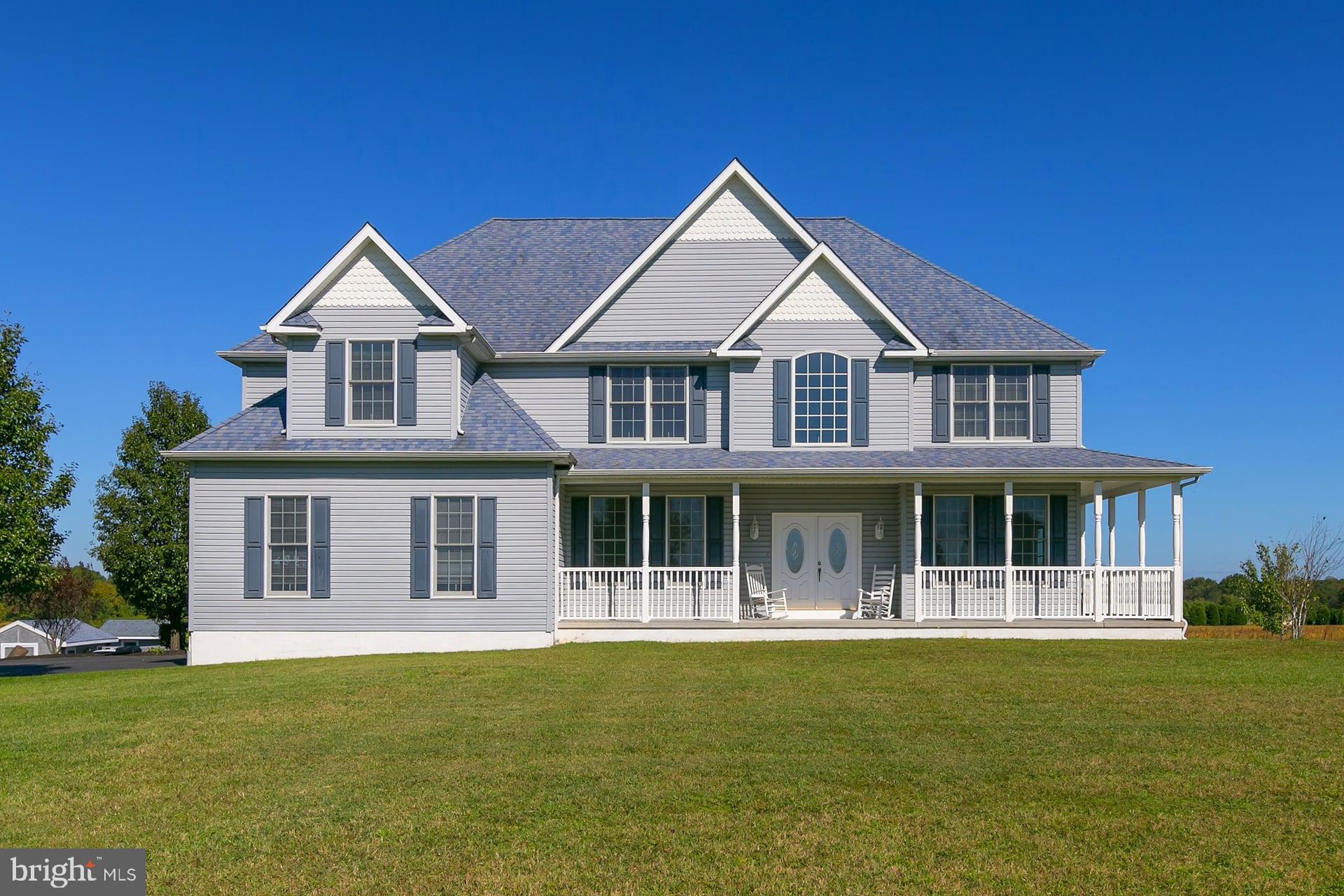 221 Point Airy Road Pilesgrove, NJ 08098 - Photo 1 of 34 front view of a house with a yard