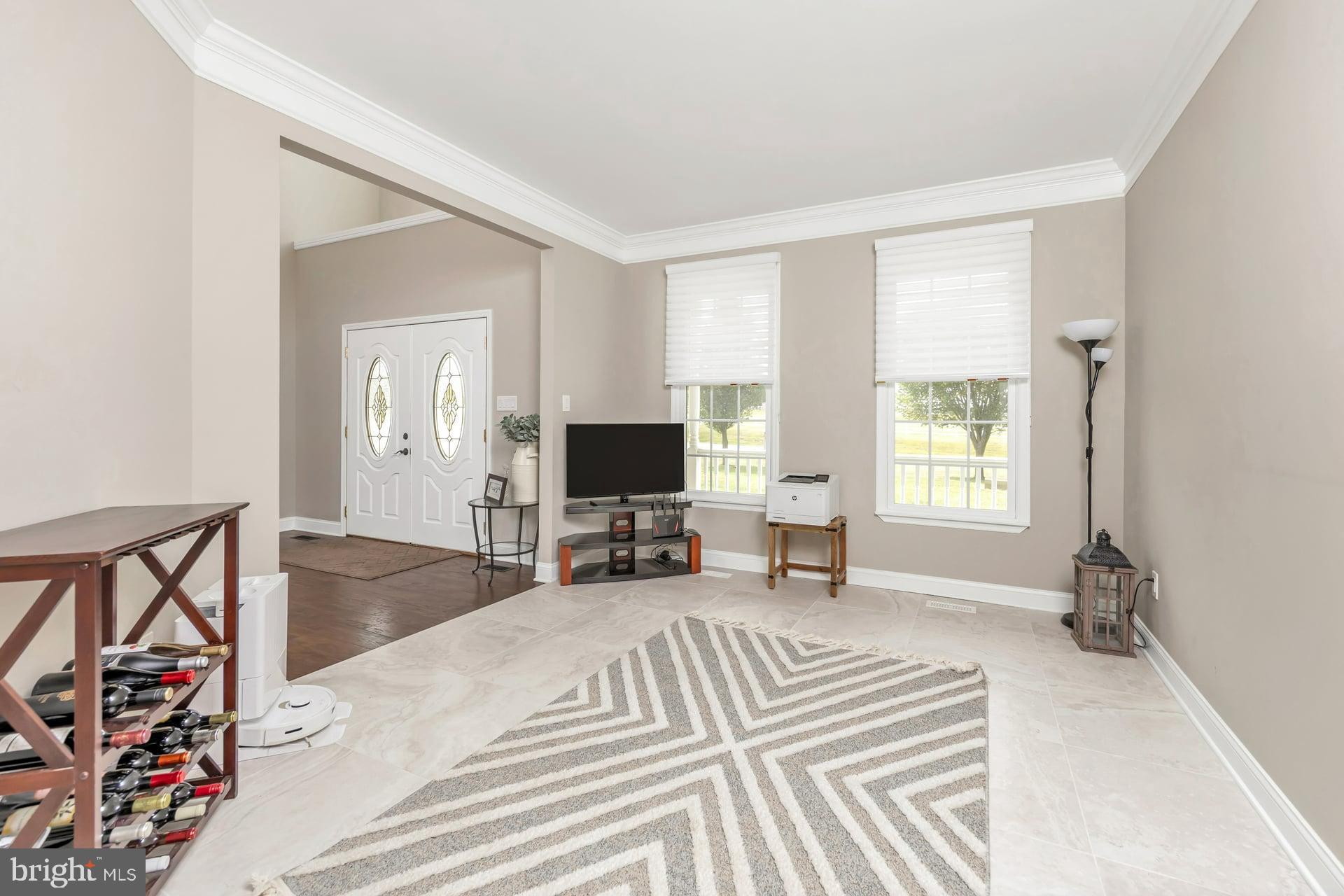 221 Point Airy Road Pilesgrove, NJ 08098 - Photo 19 of 34 a bedroom with a bed and a flat screen tv