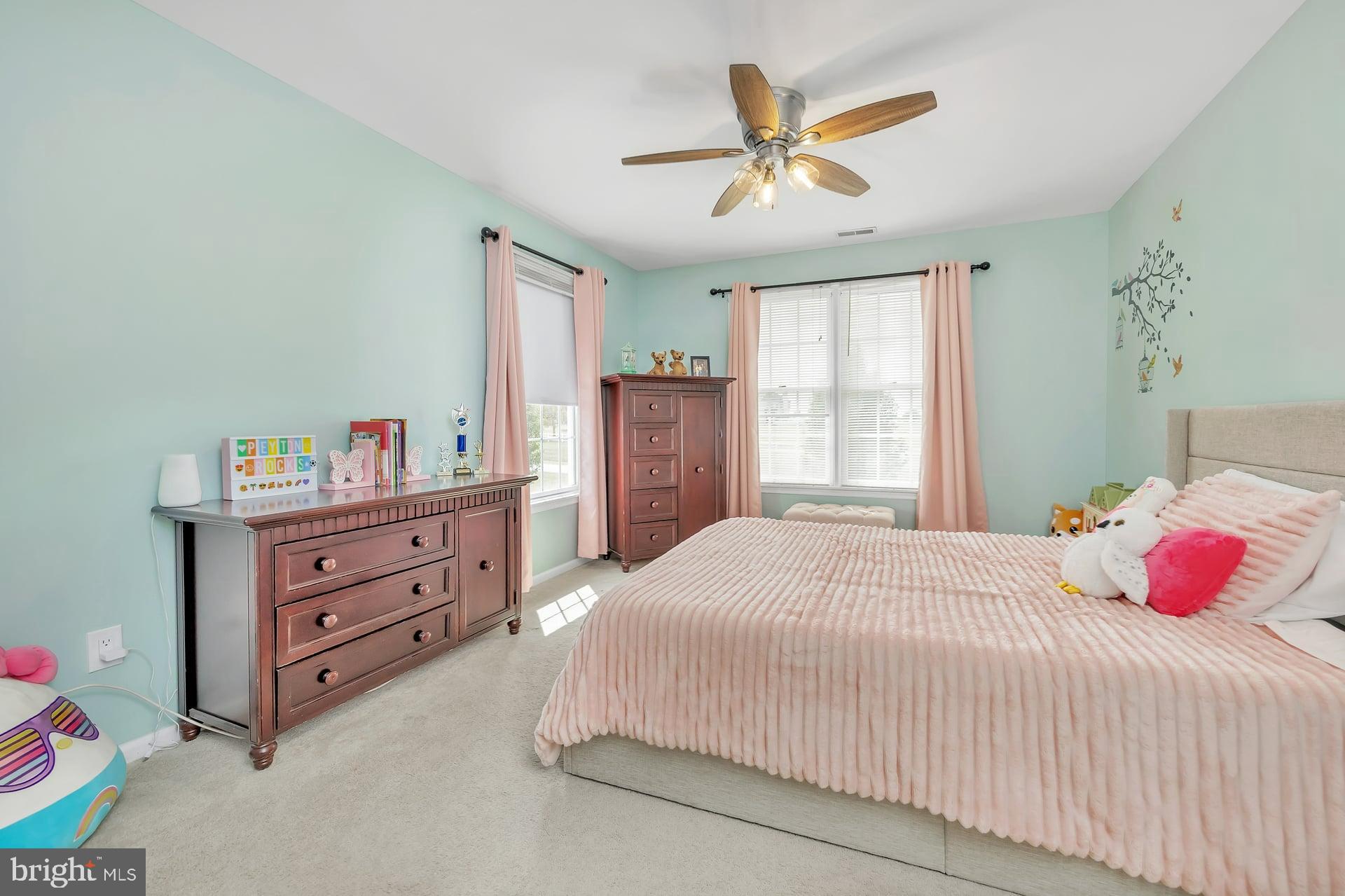 221 Point Airy Road Pilesgrove, NJ 08098 - Photo 29 of 34 a bedroom with a bed and a dresser