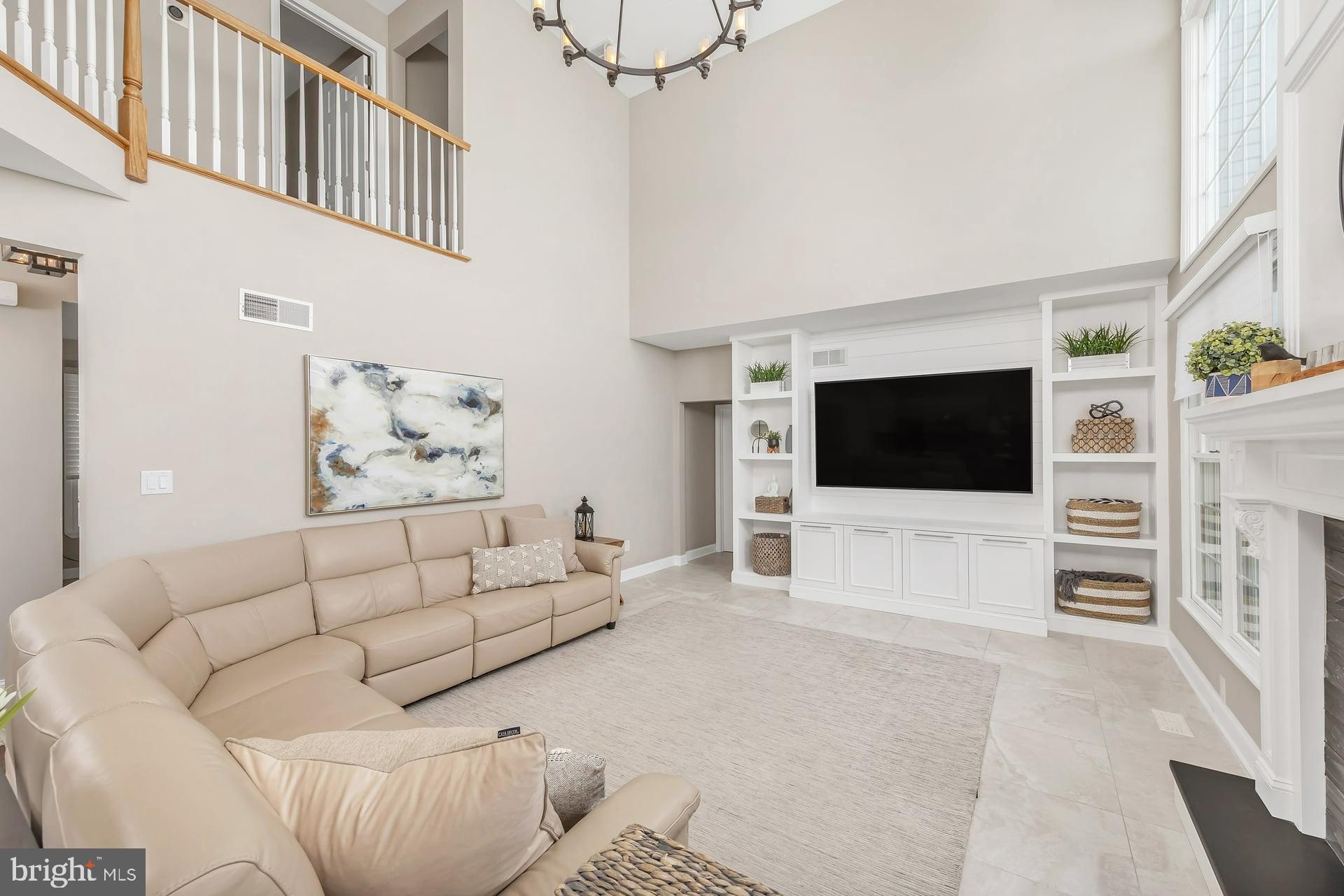 221 Point Airy Road Pilesgrove, NJ 08098 - Photo 7 of 34 a living room with furniture and a flat screen tv