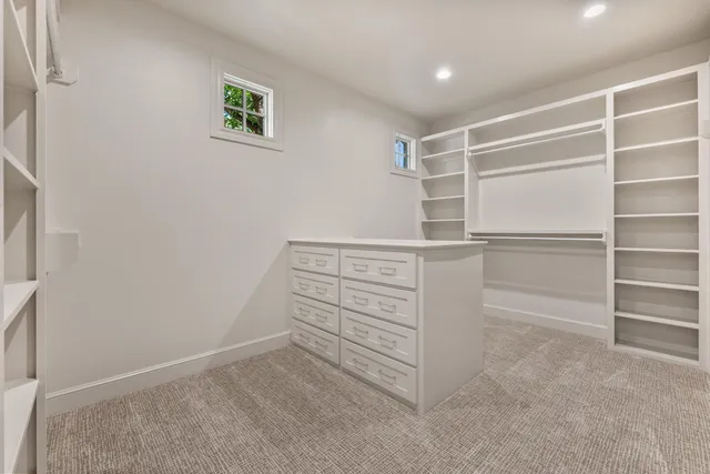 a view of an empty walk in closet