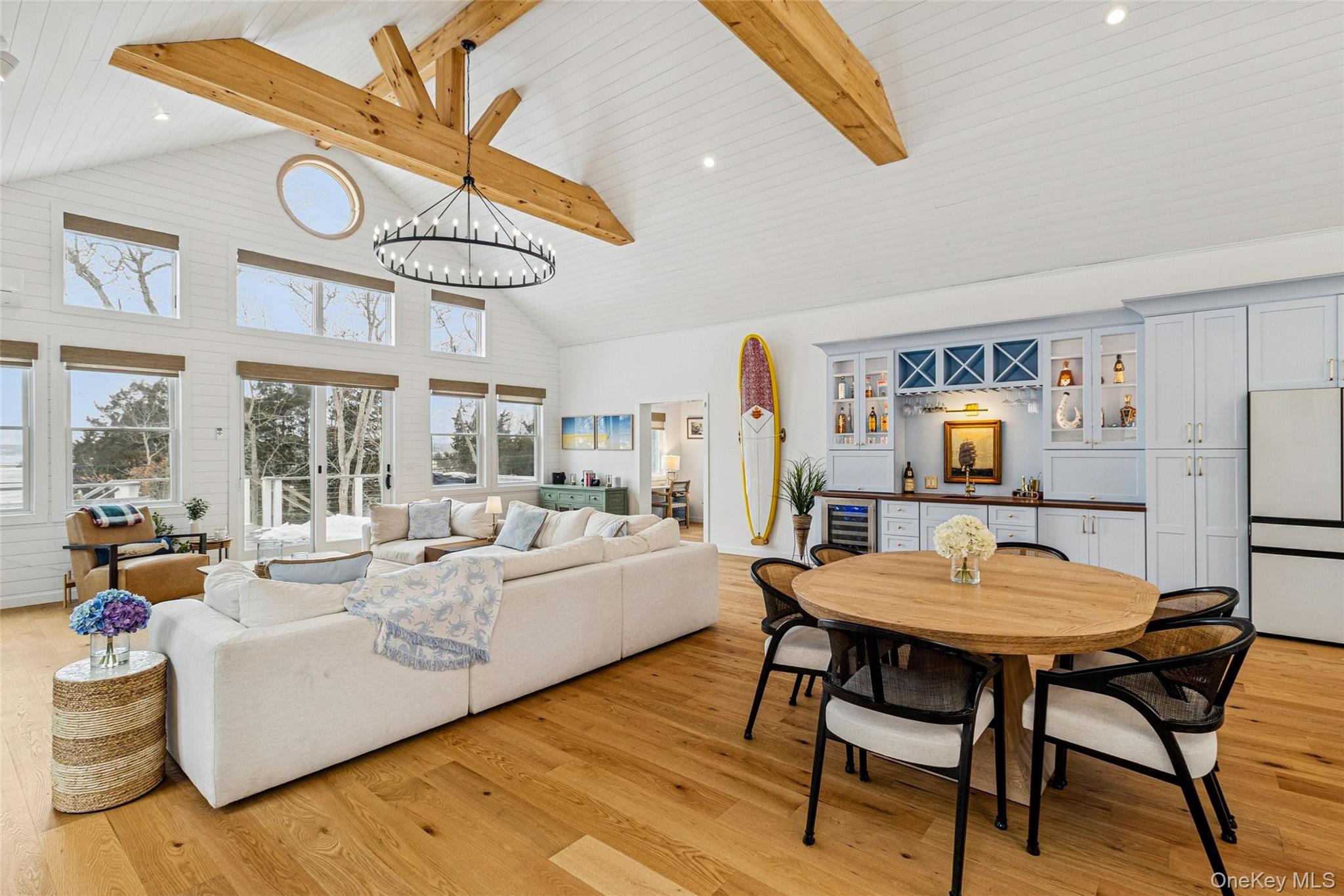 80 Louse Point Road East Hampton, NY 11937 - Photo 3 of 19 a living room with furniture and a large window