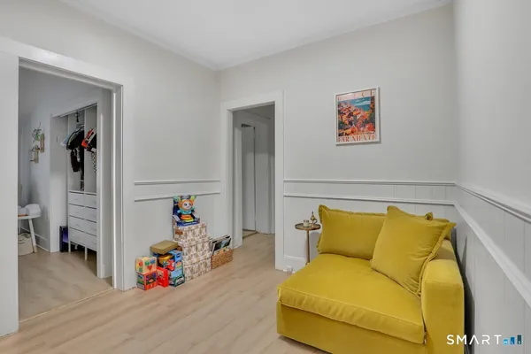 a bedroom with furniture and a bed