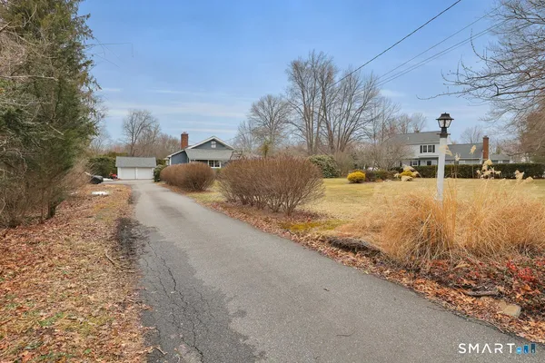 a view of a yard covered in snow