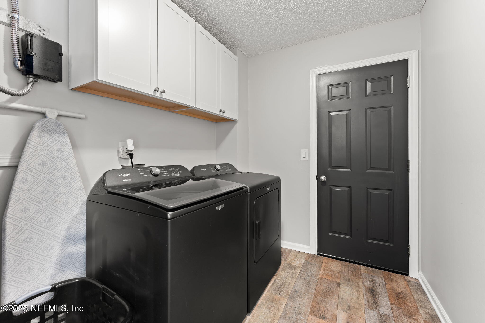 2982 Chief Ridaught Trail Middleburg, FL 32068 - Photo 26 of 29 a kitchen with stainless steel appliances granite countertop a refrigerator and a sink