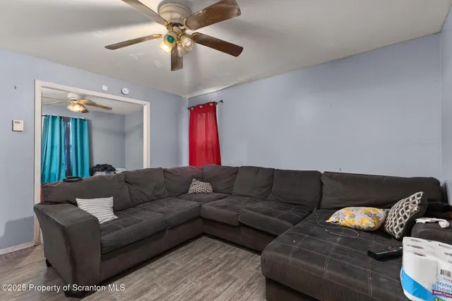 a living room with furniture and a couch