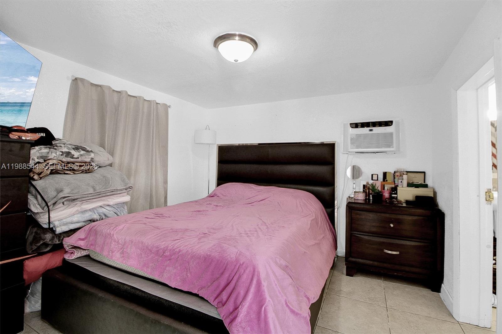 2900 Northwest 95th Street Miami, FL 33147 - Photo 36 of 48 a bedroom with a bed and a closet