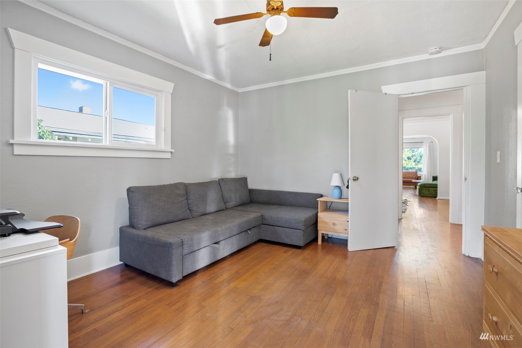 4632 Fawcett Avenue Tacoma, WA 98408 - Photo 24 of 35 a living room with furniture and a wooden floor