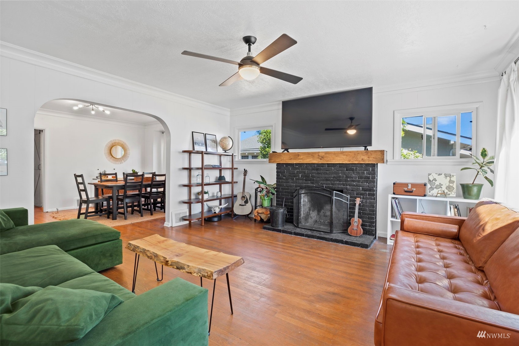 4632 Fawcett Avenue Tacoma, WA 98408 - Photo 5 of 35 a living room with furniture and a fireplace