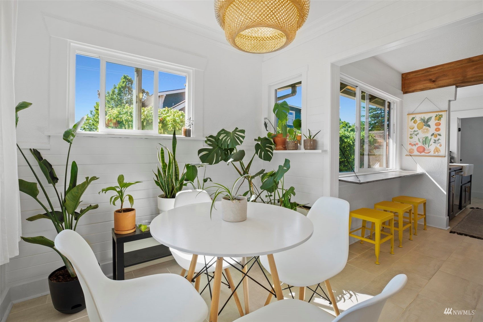 4632 Fawcett Avenue Tacoma, WA 98408 - Photo 8 of 35 a view of a dining room with furniture window and wooden floor