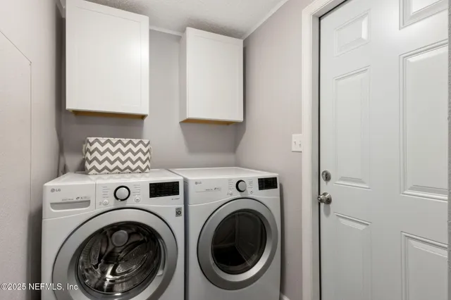 a view of a balcony with chairs