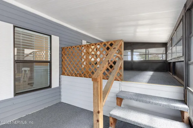 a view of a patio with swimming pool table and chairs
