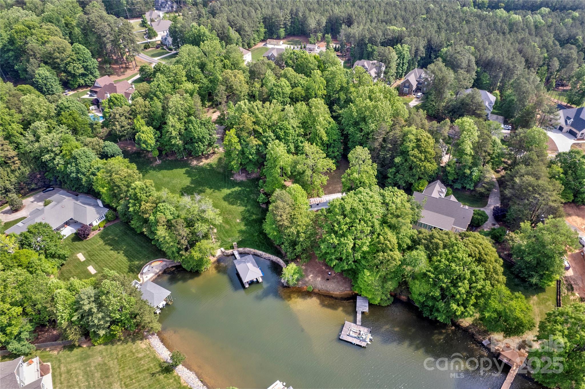 669 Kenway Loop Mooresville, NC 28117 - Photo 4 of 11 a view of a garden with a fountain
