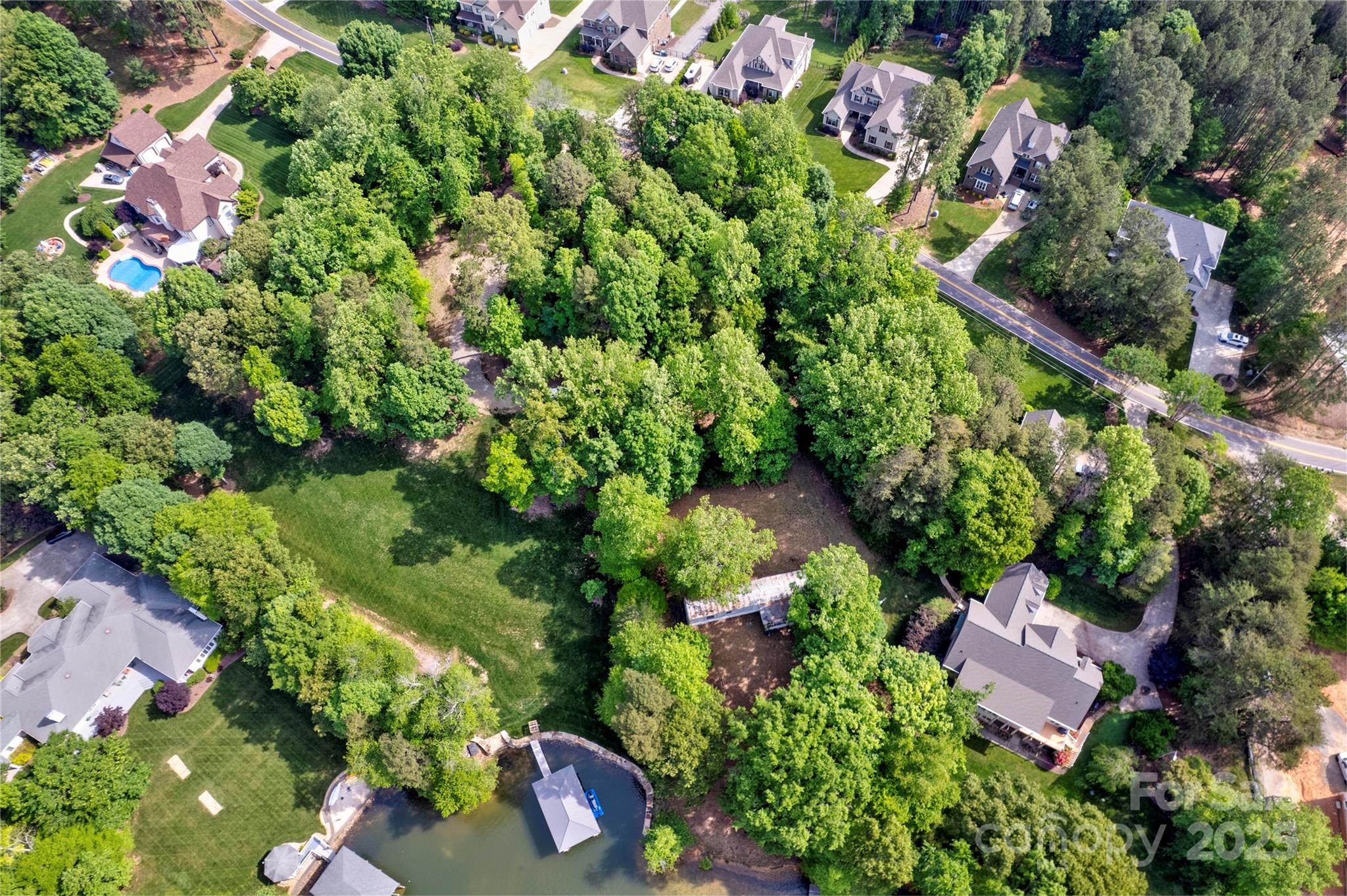 669 Kenway Loop Mooresville, NC 28117 - Photo 5 of 11 an aerial view of a house with a yard