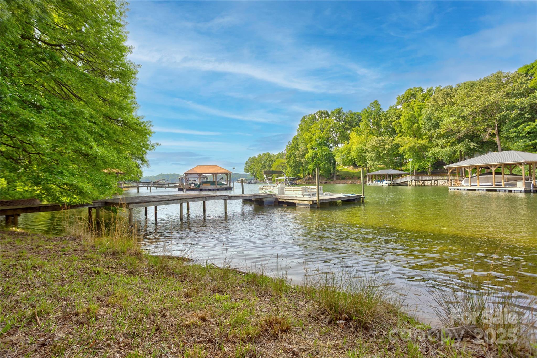 669 Kenway Loop Mooresville, NC 28117 - Photo 9 of 11 a view of a lake with houses