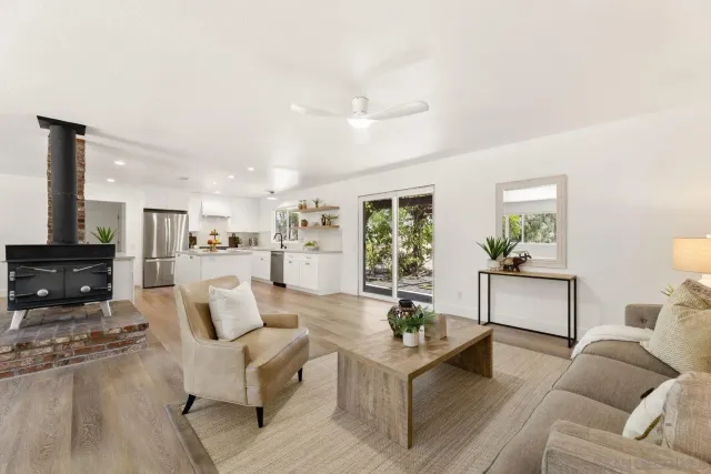a kitchen with a sink a stove and refrigerator