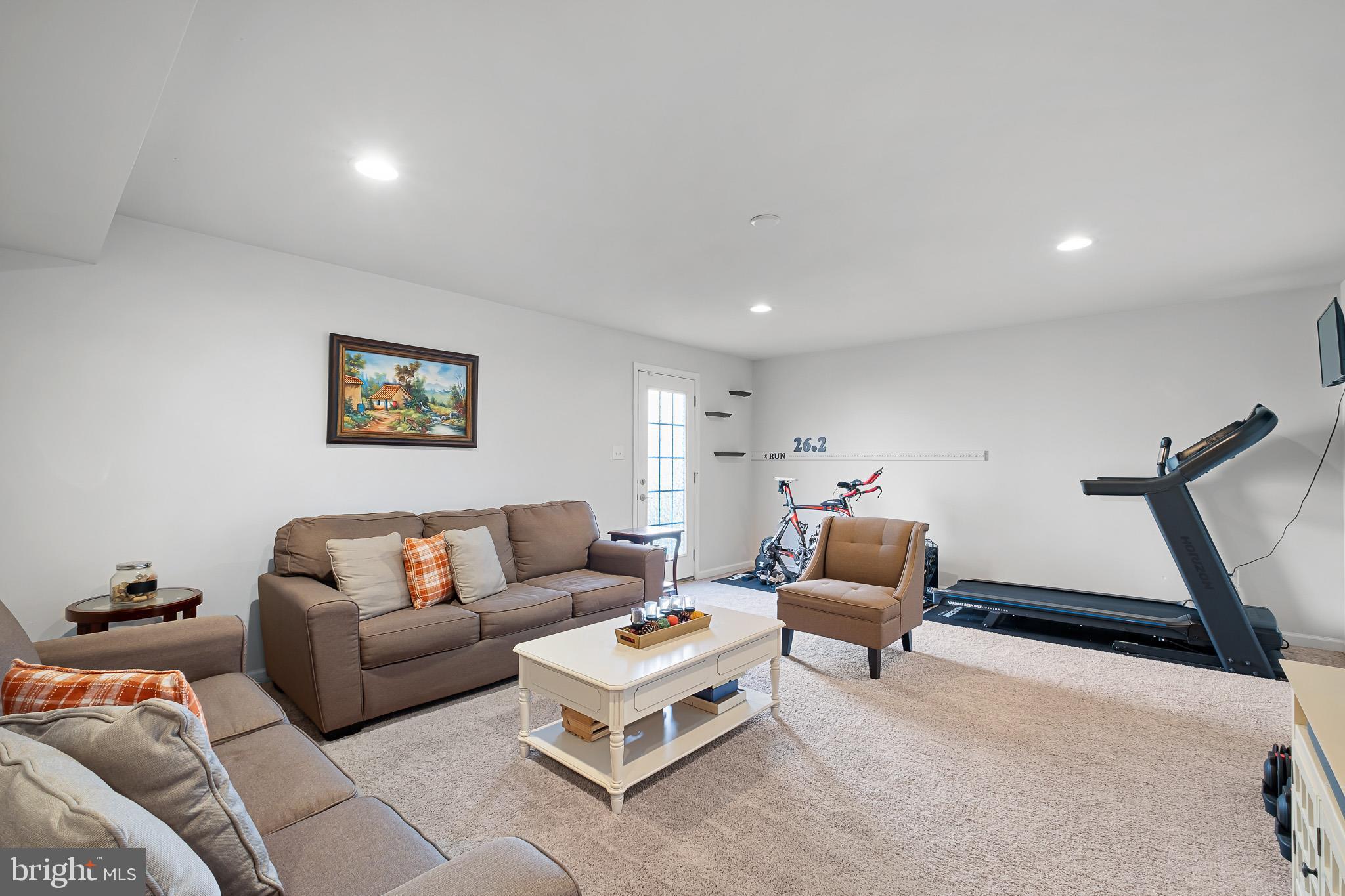449 Smee Road Middletown, DE 19709 - Photo 19 of 31 a living room with furniture and a couch