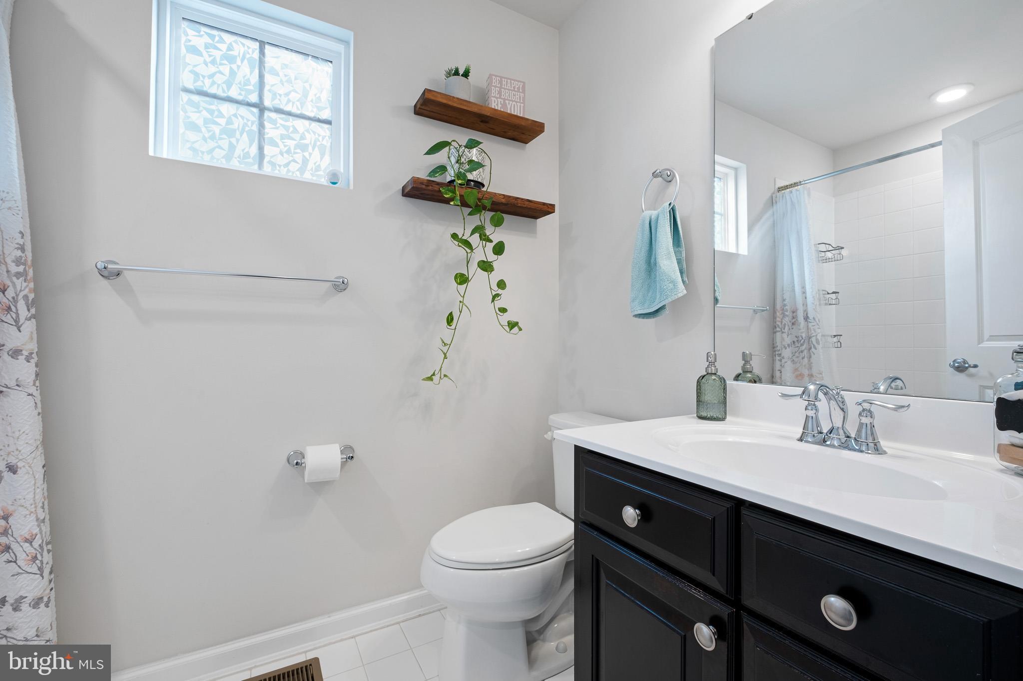 449 Smee Road Middletown, DE 19709 - Photo 25 of 31 a bathroom with a sink vanity and toilet