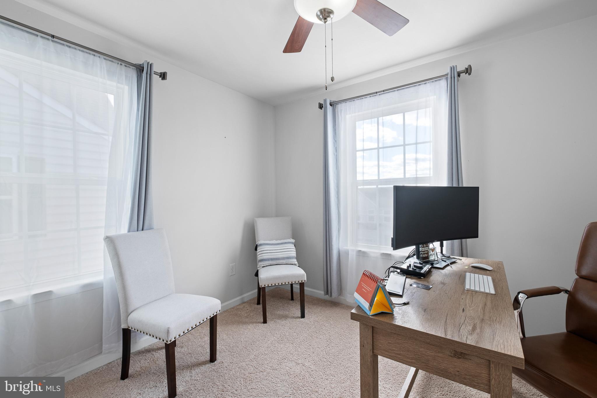 449 Smee Road Middletown, DE 19709 - Photo 27 of 31 a view of a workspace with furniture and a window
