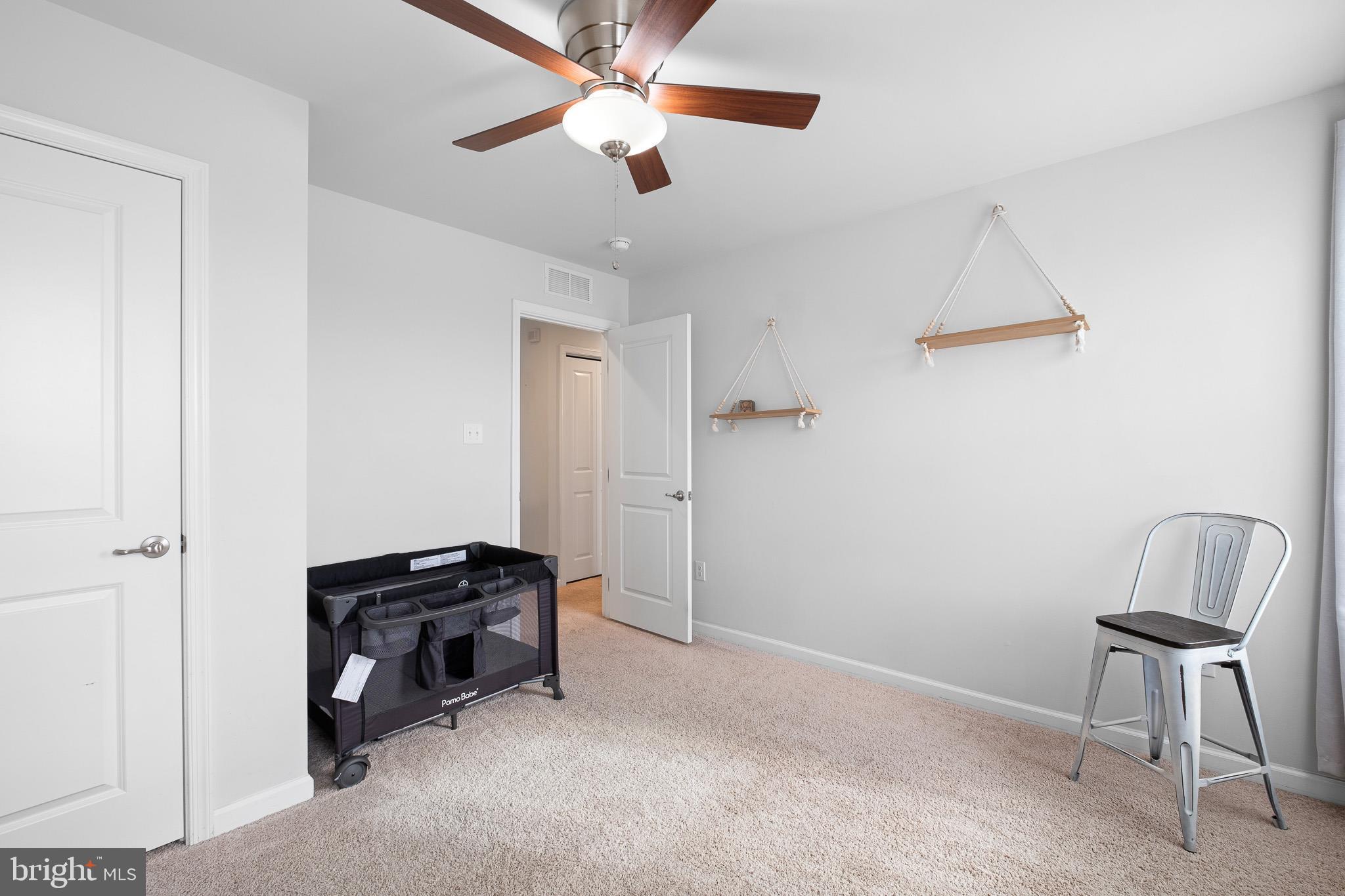 449 Smee Road Middletown, DE 19709 - Photo 28 of 31 a view of workspace and bedroom with furniture