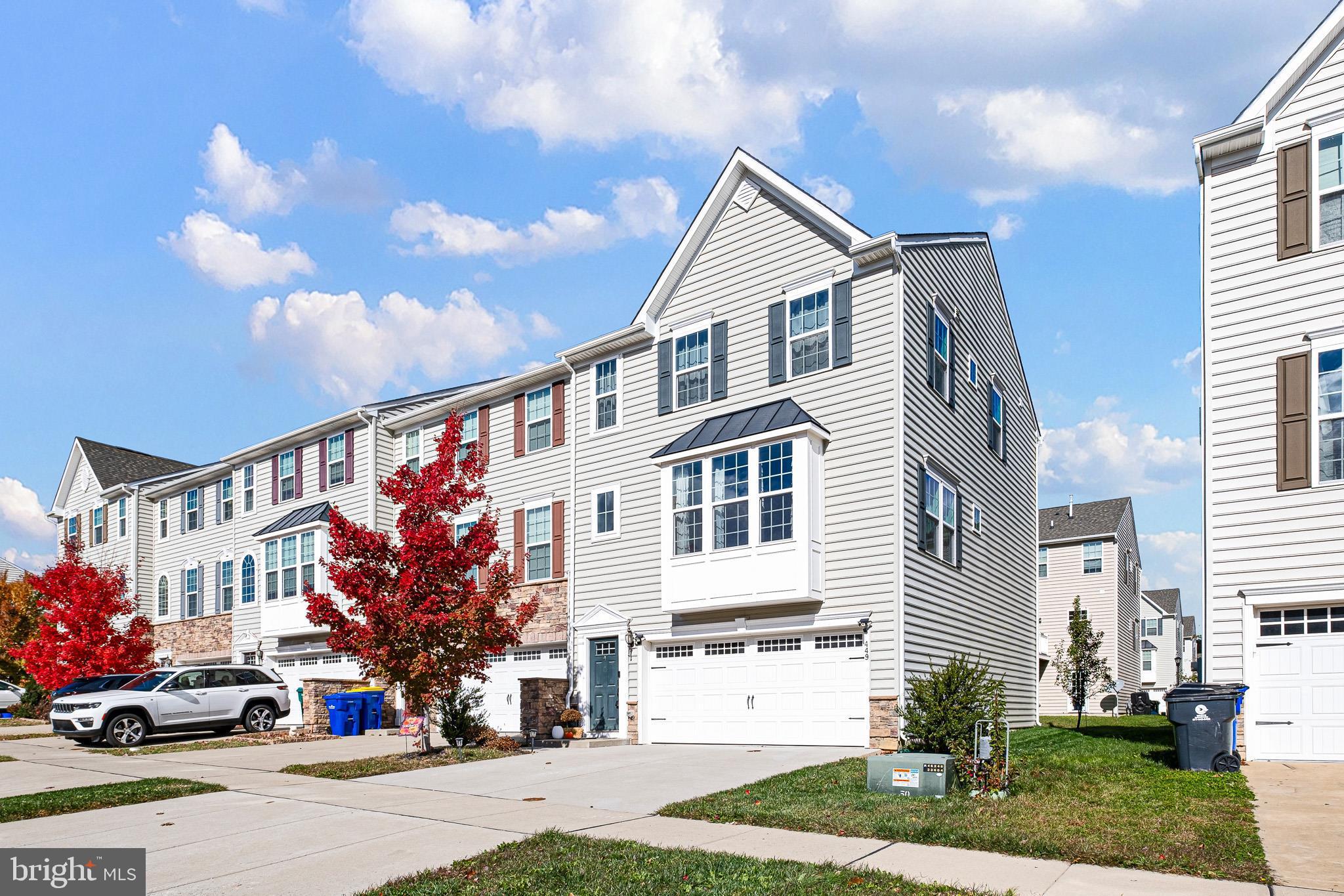 449 Smee Road Middletown, DE 19709 - Photo 3 of 31 a front view of a house with a yard and garage