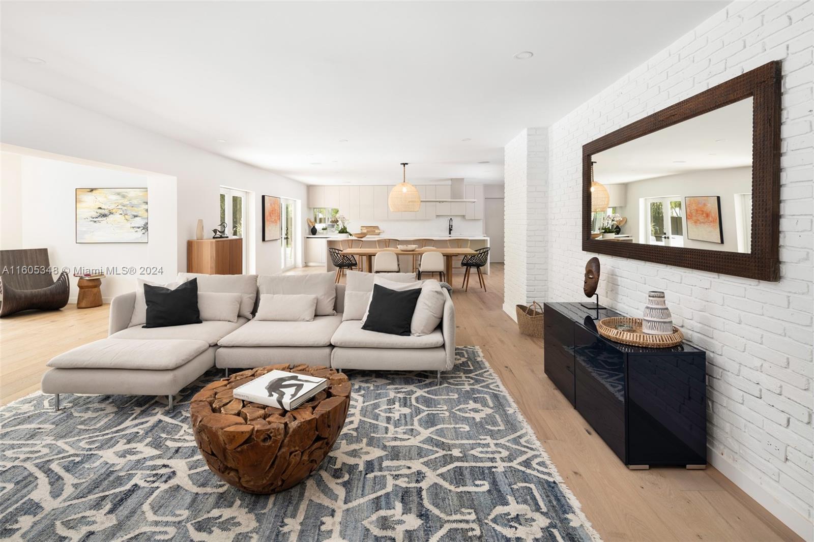 9800 Southwest 70th Avenue Pinecrest, FL 33156 - Photo 6 of 46 a living room with furniture and a rug